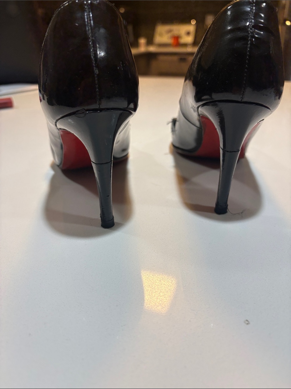 Christian Louboutin Black Patent Pumps with Signature Red Soles